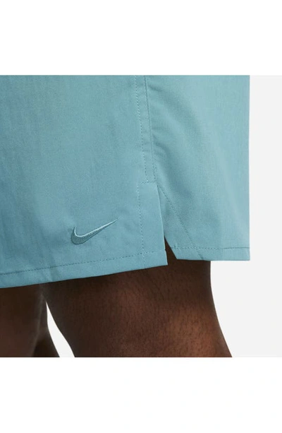 Shop Nike Dri-fit Unlimited 7-inch Unlined Athletic Shorts In Mineral Teal/ Black
