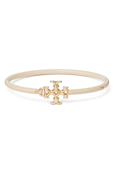 Shop Tory Burch Eleanor Hinged Cuff Bracelet In Tory Gold / Sand