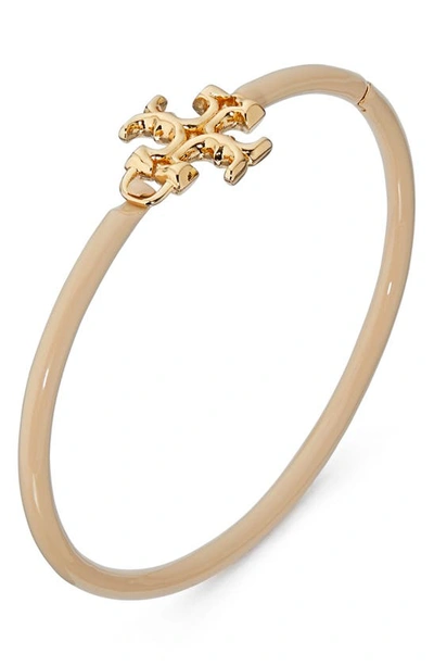 Shop Tory Burch Eleanor Hinged Cuff Bracelet In Tory Gold / Sand