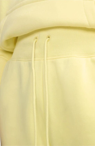 Shop Nike Sportswear Phoenix Fleece Sweatpants In Lemon Chiffon/ Sail