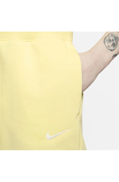 Shop Nike Sportswear Phoenix Fleece Sweatpants In Lemon Chiffon/ Sail