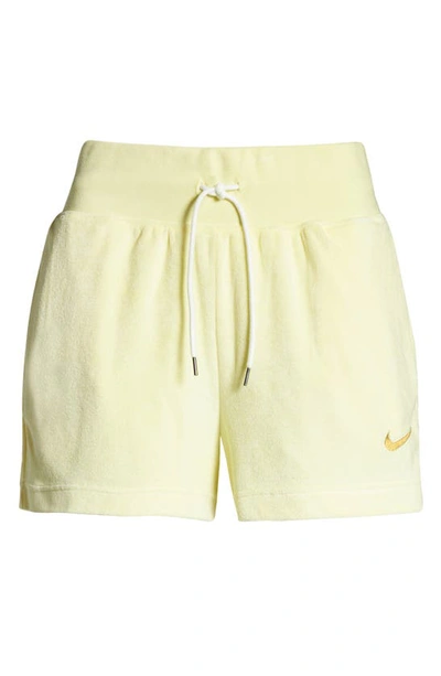 Shop Nike Sportswear Terry Shorts In Citron Tint/ Wheat Gold