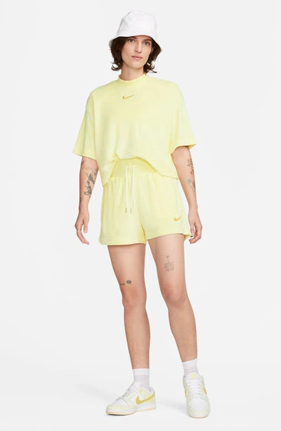 Shop Nike Sportswear Terry Shorts In Citron Tint/ Wheat Gold