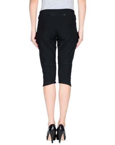 Shop Nike Cropped Pants & Culottes In Black