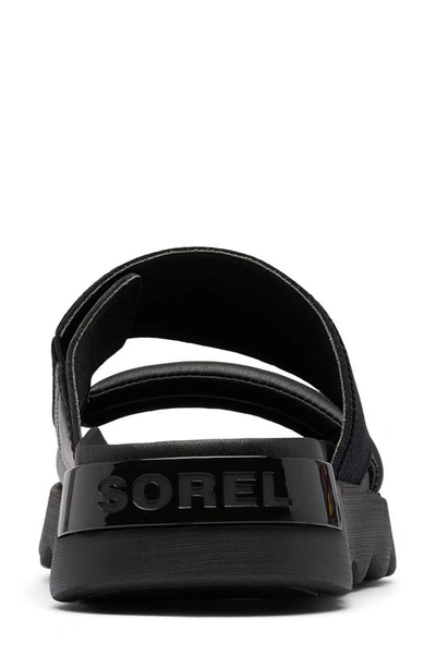 Shop Sorel Viibe Asymmetric Slide Sandal In Black/ Black