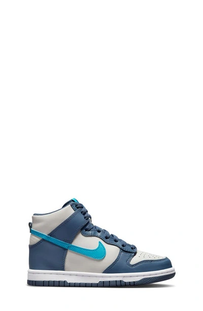 Shop Nike Kids' Dunk Hi Basketball Shoe In Light Bone / Blue Lightning