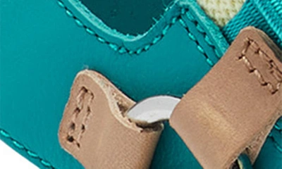 Shop Sorel Kinetic™ Y-strap Sandal In Teal Chloride/ Sea Salt