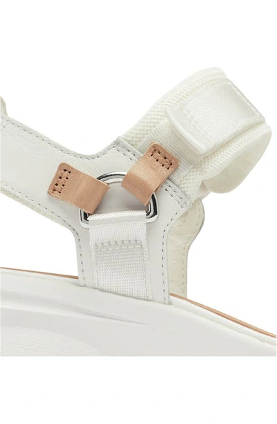 Shop Sorel Kinetic™ Y-strap Sandal In Sea Salt/ Radiation