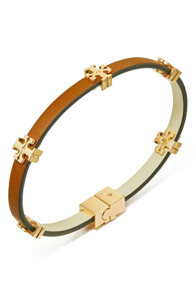 Shop Tory Burch Eleanor Station Hinge Bracelet In Tory Gold / Cuoio