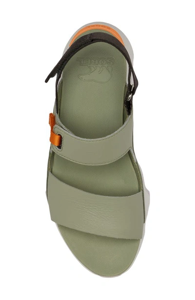 Shop Sorel Kinetic Impact Ii Sling Low Sandal In Safari/ Koi