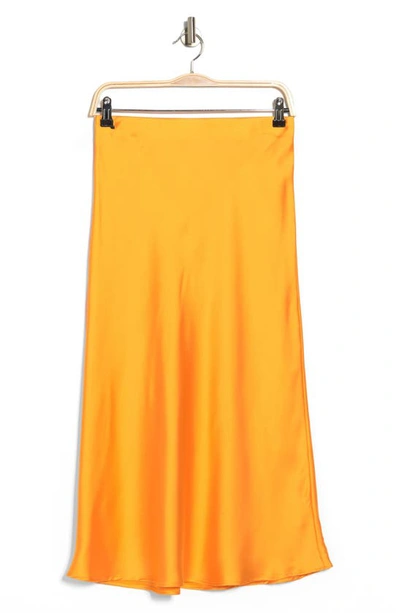 Shop Renee C Solid Satin Midi Skirt In Marigold