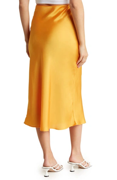 Shop Renee C Solid Satin Midi Skirt In Marigold