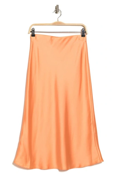 Shop Renee C Solid Satin Midi Skirt In Melon