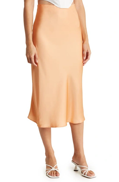 Shop Renee C Solid Satin Midi Skirt In Melon