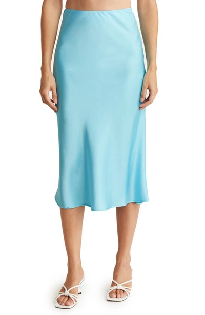 Shop Renee C Solid Satin Midi Skirt In Neon Blue