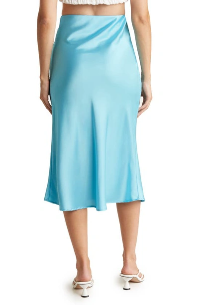 Shop Renee C Solid Satin Midi Skirt In Neon Blue