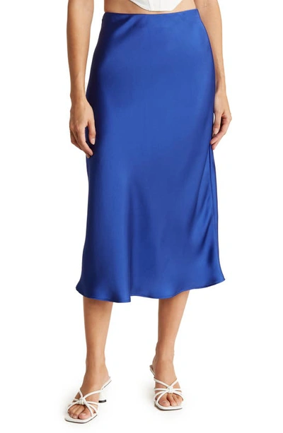 Shop Renee C Solid Satin Midi Skirt In Royal Blue