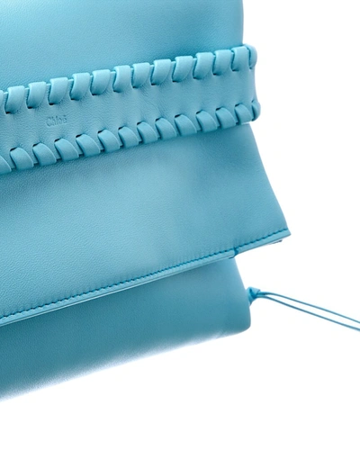 Shop Chloé Mony Leather Clutch In Blue
