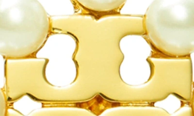 Shop Tory Burch Kira Imitation Pearl Stud Earrings In Tory Gold / Cream
