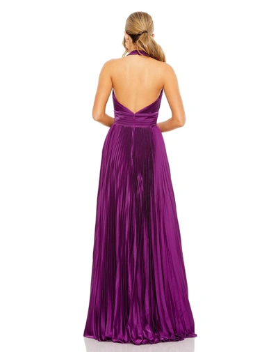 Shop Mac Duggal Pleated Halter Neck Gown With Center Bow In Plum