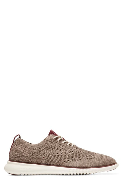 Shop Cole Haan 2.zerogrand Stitchlite Water Resistant Wingtip In Ch Truffle/ Ivory