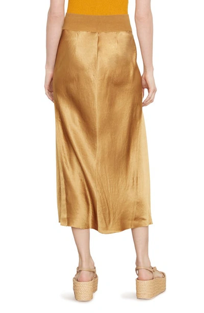 Shop Vince Exposed Raw Seam Satin Skirt In Amber Wave