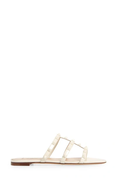 Shop Valentino Rockstud Slide Sandal In Ivory