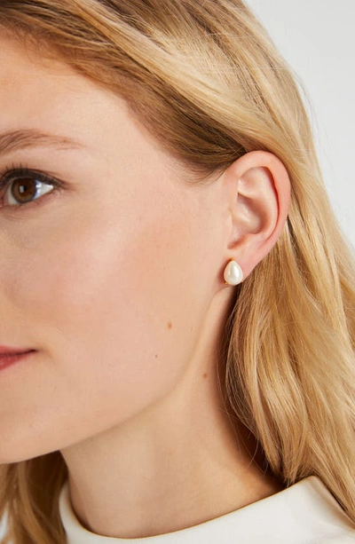 Shop Kate Spade Imitation Pearl Stud Earrings In Cream/ Gold