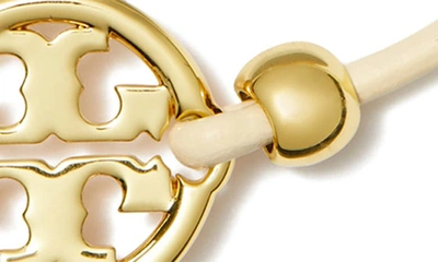 Shop Tory Burch Miller Logo Slider Bracelet In Tory Gold / Ivory