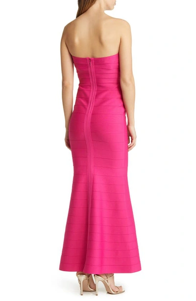 Shop Bebe Strapless Bandage Gown In Fuchsia