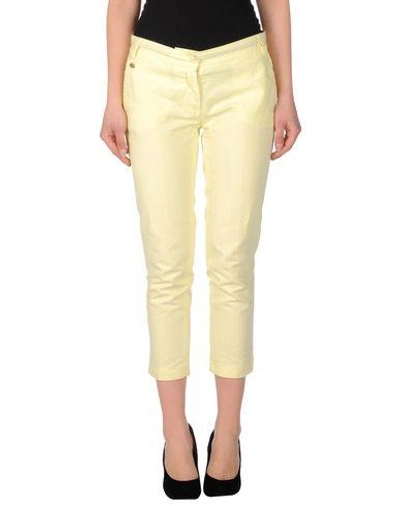 Shop Manila Grace Cropped Pants & Culottes In Yellow