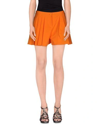 Shop Moschino Cheap & Chic Shorts In Orange