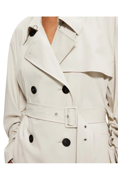 Shop Theory Sleek Double Breasted Cotton Blend Trench Coat In Sand