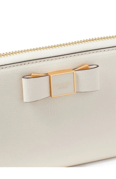 Kate Spade Morgan Embellished Bow Saffiano Leather Wallet In Parchment.