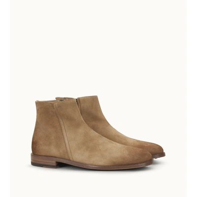 Shop Tod's Ankle Boots In Suede In Beige
