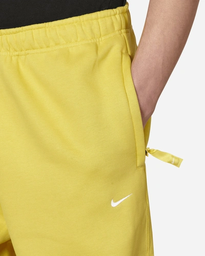Shop Nike Solo Swoosh Sweatpants Yellow In Multicolor