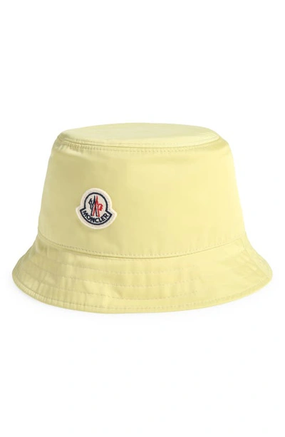 Shop Moncler Logo Patch Bucket Hat In Yellow