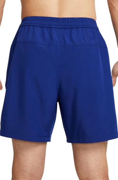 Shop Nike Dri-fit Form Athletic Shorts In Deep Royal Blue/ Black