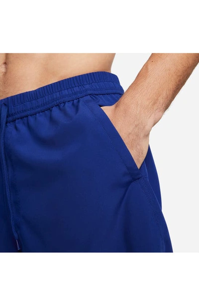 Shop Nike Dri-fit Form Athletic Shorts In Deep Royal Blue/ Black