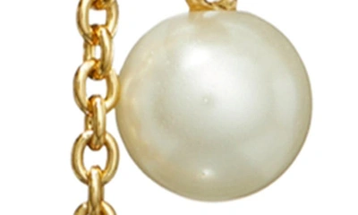 Shop Tory Burch Kira Imitation Pearl Linear Drop Earrings In Tory Gold / Cream