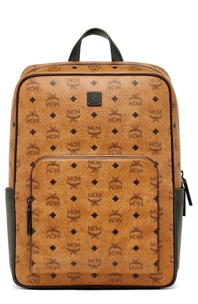 Shop Mcm Medium Aren Coated Canvas Backpack In Cognac