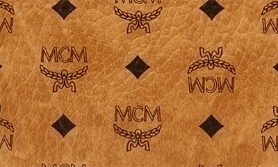 Shop Mcm Medium Aren Coated Canvas Backpack In Cognac