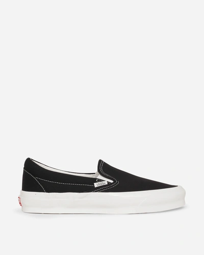 Shop Vans Classic Slip-on Lx Sneakers In Black