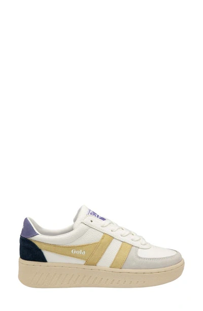 Shop Gola Classics Grandslam Trident Sneaker In White/ Lemon/ Lavender