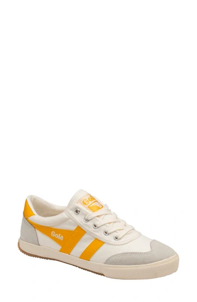 Shop Gola Badminton Sneaker In Off White/ Yellow