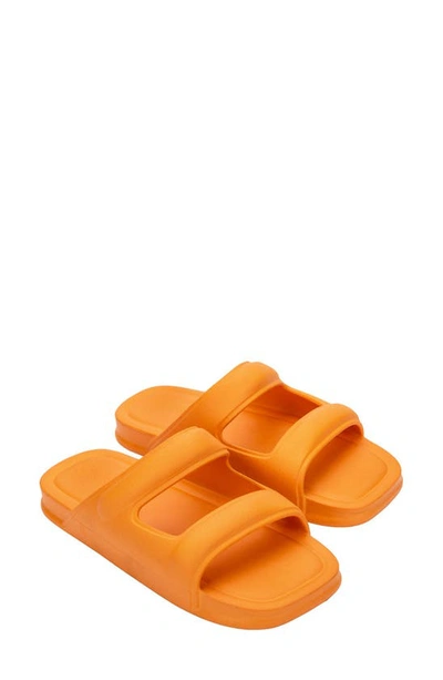 Shop Melissa Free Grow Slide Sandal In Orange