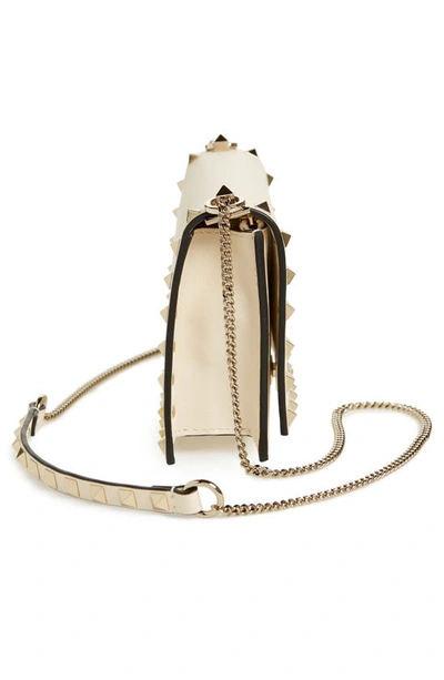 Shop Valentino Rockstud Leather Crossbody Bag In I16 Light Ivory