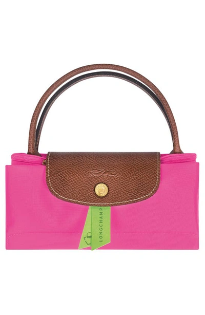 Shop Longchamp Small Le Pliage Top Handle Bag In Candy