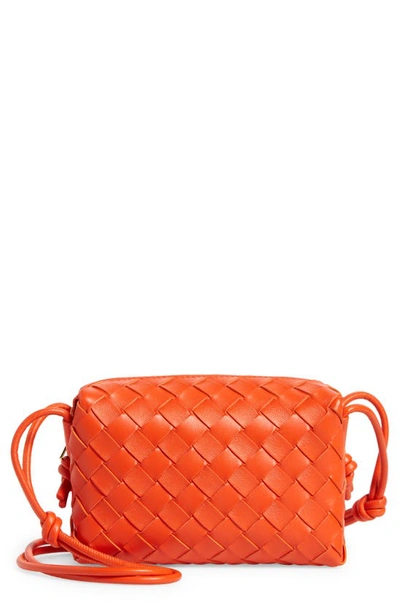 Shop Bottega Veneta Small Intrecciato Leather Crossbody Bag In 7642 Orange-gold