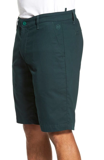 Shop Ag Green Label 'the Canyon' Flat Front Performance Shorts In Scots Pine